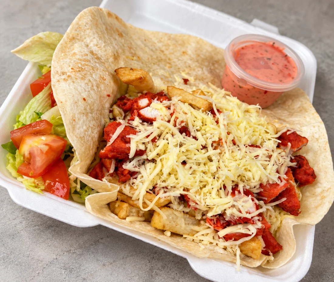 Chicken wrap meal with salad and sauce in Cambuslang